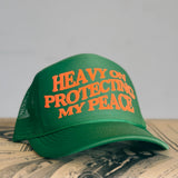 HEAVY ON PROTECTING MY PEACE Trucker Cap (More Colors)