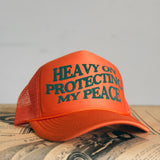 HEAVY ON PROTECTING MY PEACE Trucker Cap (More Colors)